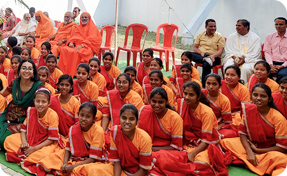Students dressed beautifully for the Pran Pratishtha ceremony for the new campus temple