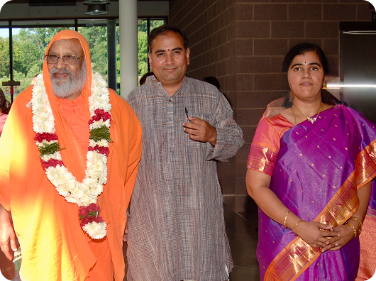 Viji and Krishnakumar (KK) Davey with Swamiji